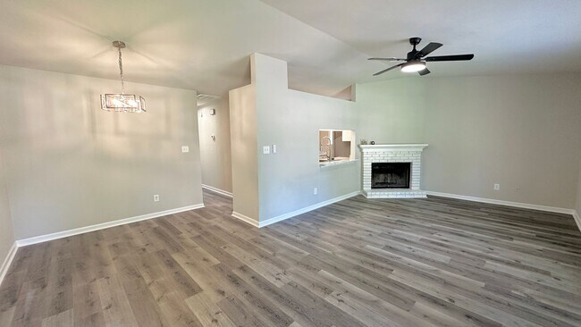 Photo - RENOVATED 2/2 w/ Updated Flooring, Paint, Appliances, & Fixtures! Open Floor Plan & Fenced Yard! ...