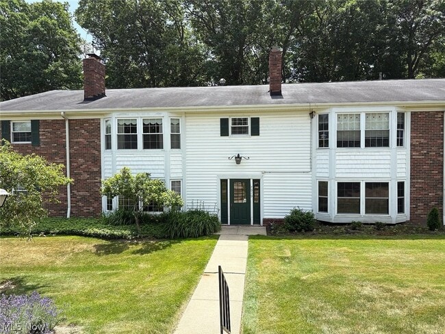 Building Photo - 7010 Carriage Hill Dr Unit 201