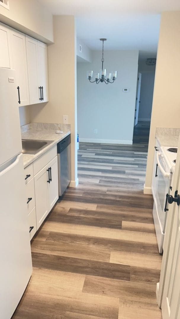 Photo - Fun and Stylish Living at Madison Manor! Top-Floor Condo with Vaulted Ceilings and Skylights