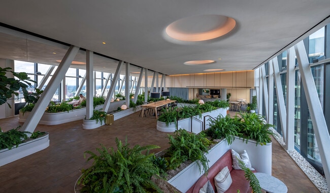 Gather with friends and neighbors on the Skybridge complete with a shared kitchen and plenty of seating for remote work