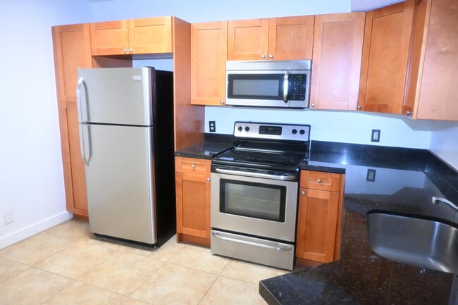 Photo - 8721 Wiles Rd Unit 305
