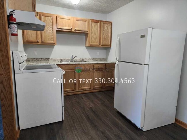 Building Photo - 7270 Stuhldreher St NW Unit 2