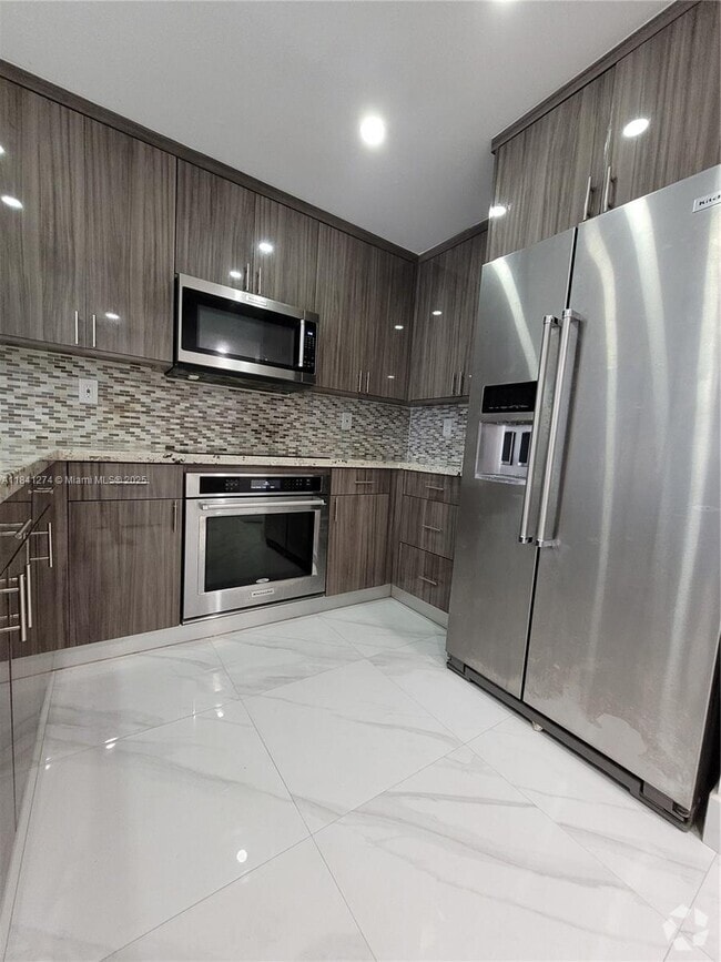 Building Photo - 7101 Byron Ave Unit 304 Rental