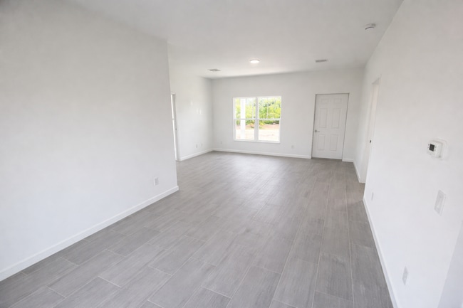 Photo - STUNNING NEW 3BR/2BA HOME WITH GARAGE -IN PRIME SW LEHIGH ACRES LOCATION