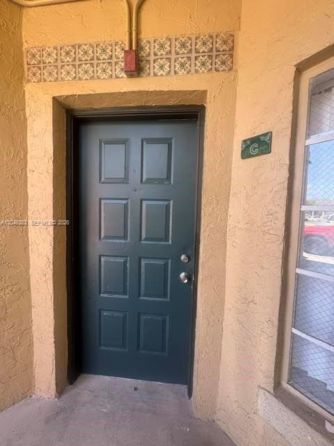 Building Photo - 18336 NW 68th Ave Unit C