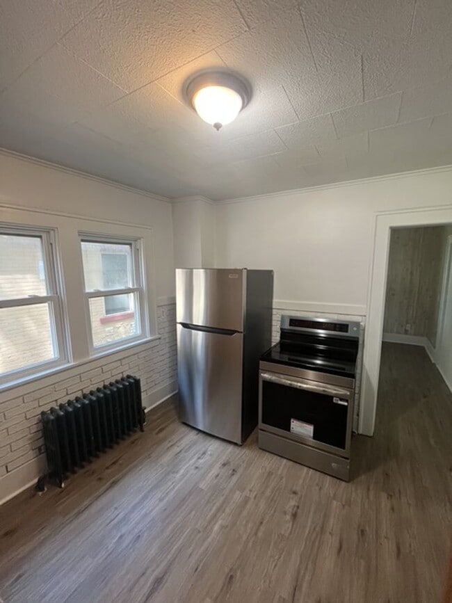 Photo - 3-Bed Home w/ Driveway & Enclosed Porches – Convenient Rochester Location