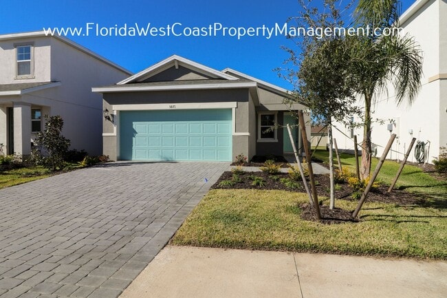 Building Photo - OUTSTANDING 3 BEDROOM/2 BATH IN EAVE'S BEND/ARTISAN LAKES PALMETTO!