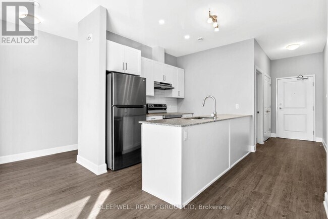 Photo - 975 N Russell Rd Unit 209