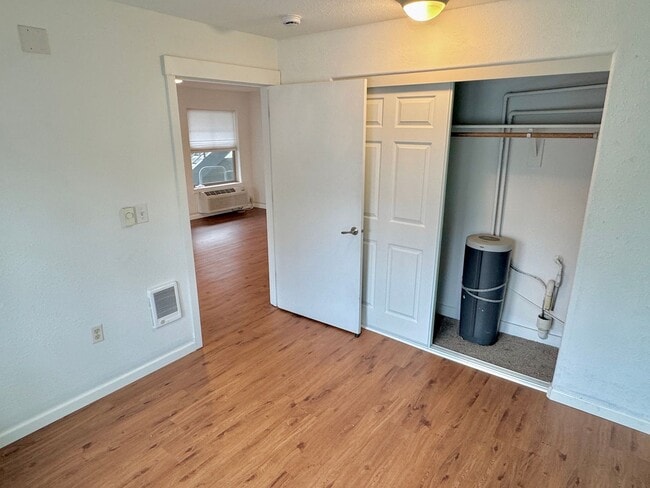 Photo - Gateway Ground Floor Corner Unit Condo with Laminate H/W's, A/C, Assigned Parking, Laundry In-Unit