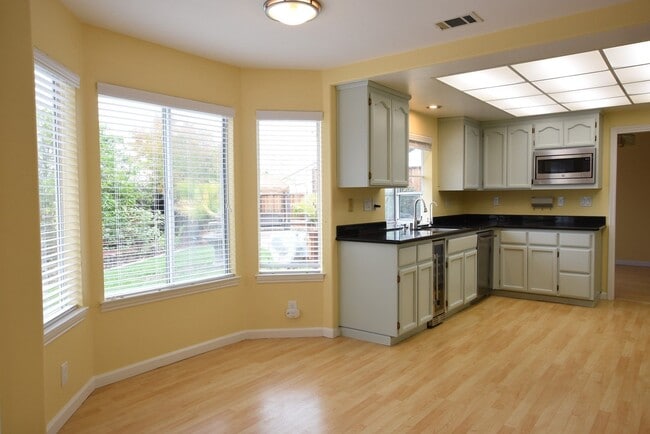 Photo - Beautiful 4 Bedroom 3 Bath Evergreen Home with Stunning Spacious Backyard!