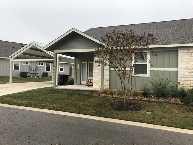 Exterior 2 car covered carport plus 2 spaces - 280A Rose Dr Townhome