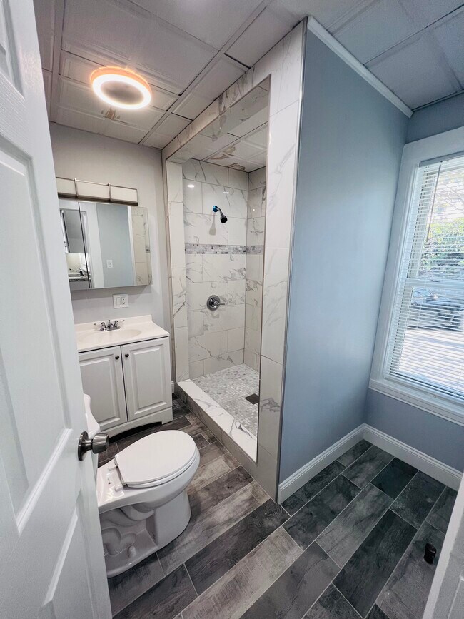 1st bathroom - 612 Mill St Unit 1