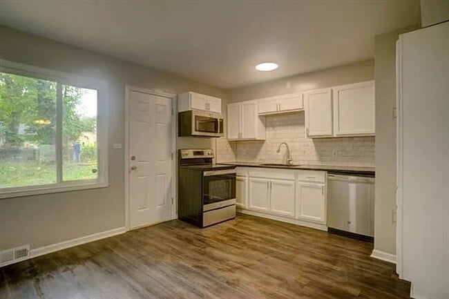 Photo - Coming Soon: Charming 3-Bedroom Retreat with Spacious Backyard!