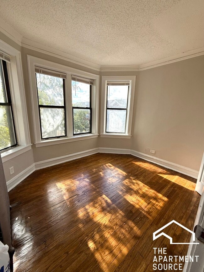 Building Photo - 6959 S Paxton Ave Unit 3E