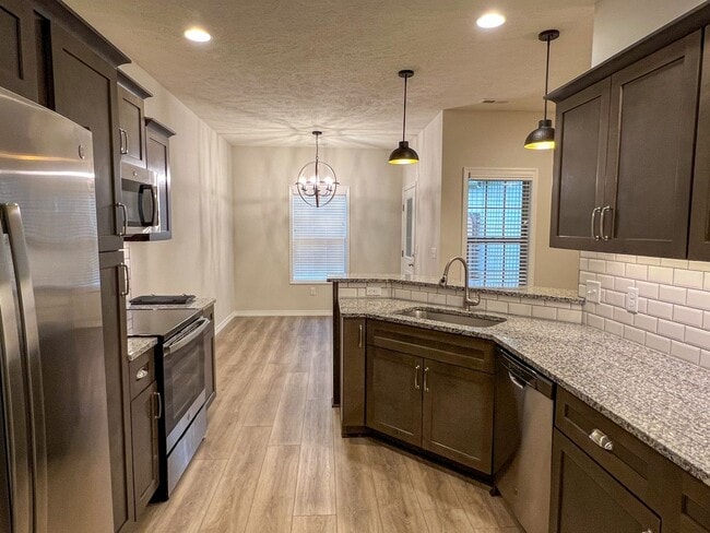 Photo - NEW LUXURY 3 BED 2 BATH 2 CAR GARAGE DUPLEX