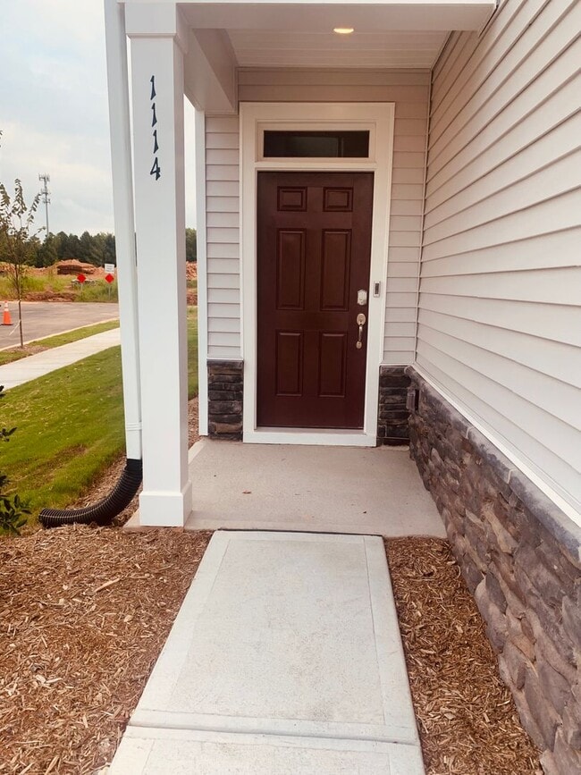 Photo - BRAND NEW TOWNHOME! 2 CAR GARAGE. SCREENED...
