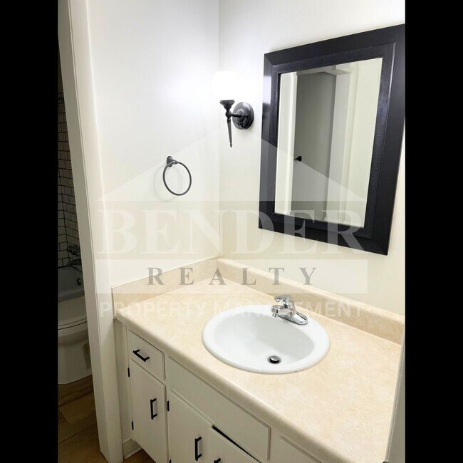 Photo - DUPLEX IN THE CITY Unit #A