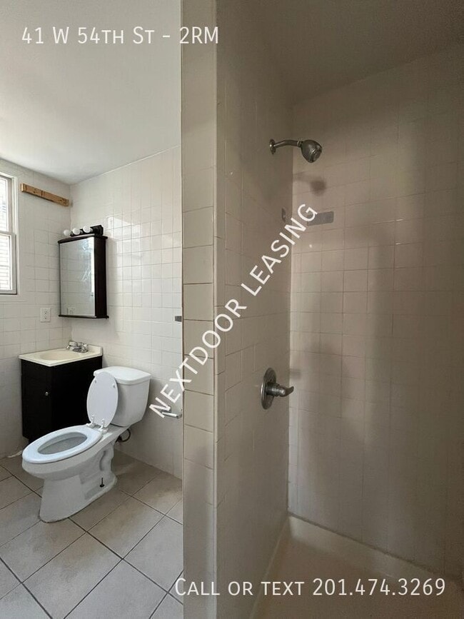 Photo - 41 W 54th St Unidad 2RM