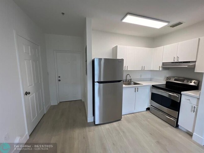 Photo - 720 NW 61st St Townhome