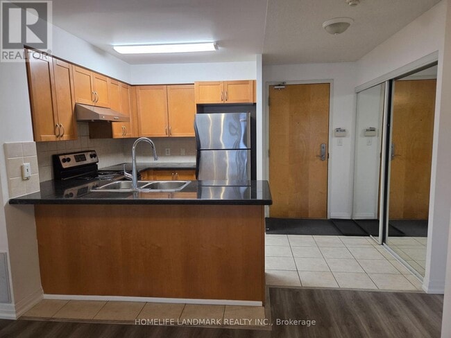 Photo - 7363 Kennedy Rd Unit 211