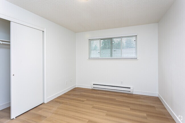 2BR, 1BA - 720SF - Primary Bedroom - Timberwood Court