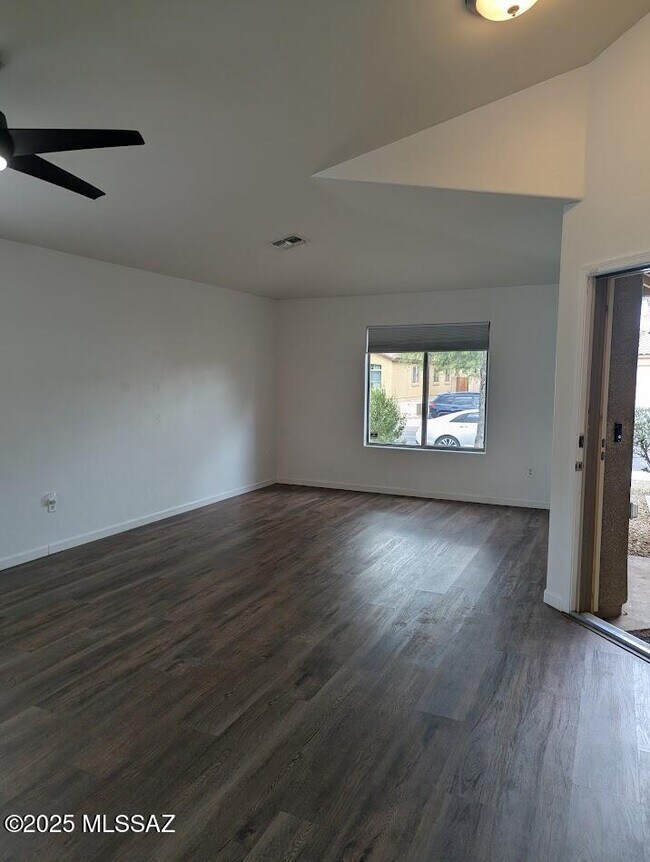 11483 W Magic Song St