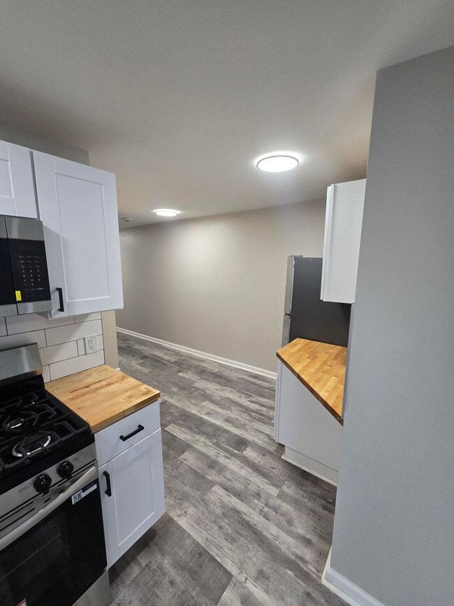 Photo - ? Modern Comfort: 3-Bedroom Living in Hartford’s Friendliest Area ? Unit 1S