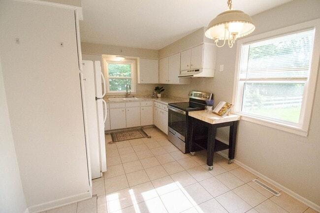 Photo - Charming Uptown Ranch-style Home with Private Fenced Backyard