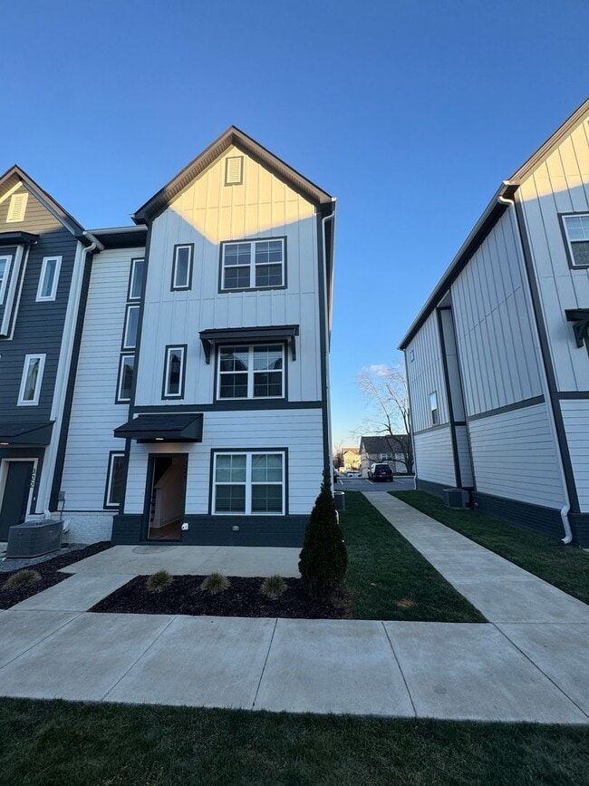 Photo - End unit overlooking courtyard, new townhome in gated community, pet friendly, 2 car garage