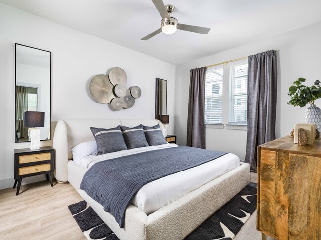 Unwind in comfort and style with Modera Georgetown's spacious bedrooms featuring large custom closets designed to accommodate your bed.