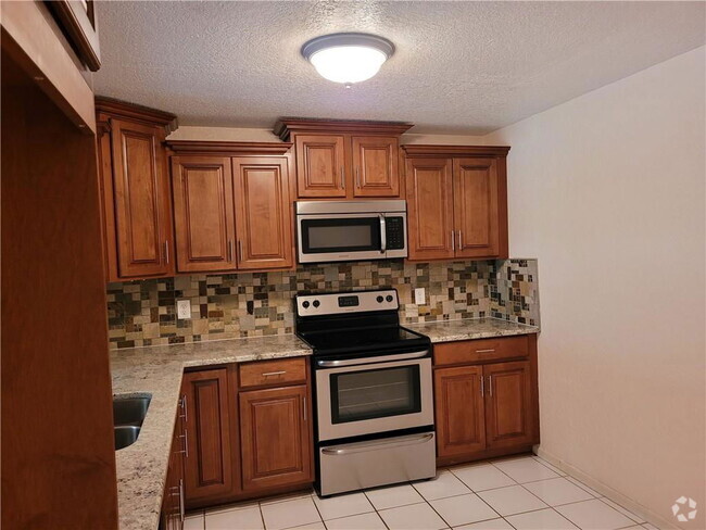 Building Photo - 2027 Coral Ridge Dr Unit 206s Rental