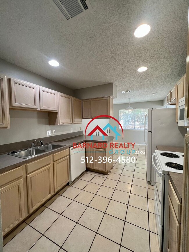 Photo - Available July 25: Spacious 3 Bedroom, 2.5 Bath Duplex with Garage