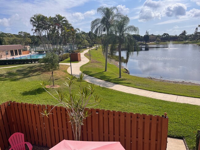 view from the balconey, steps away from the lake - 5830 SE Windsong Ln Townhome