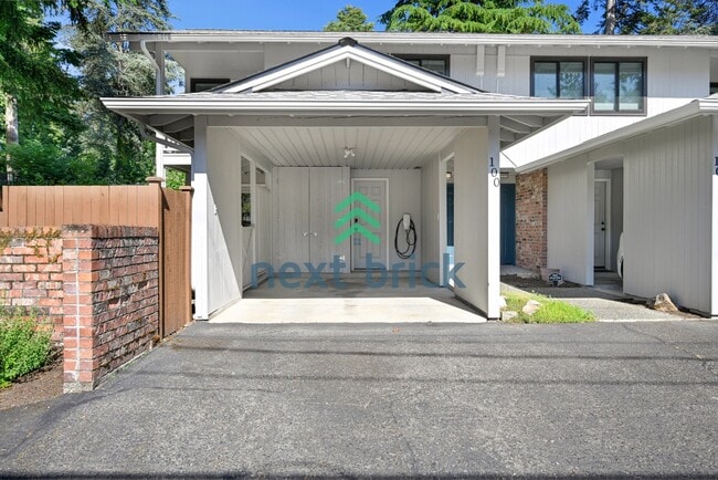 Building Photo - "Chic 2-Bed Townhouse Retreat in Bellevue – Spacious 1250 Sq Ft Living with Modern Comforts!"