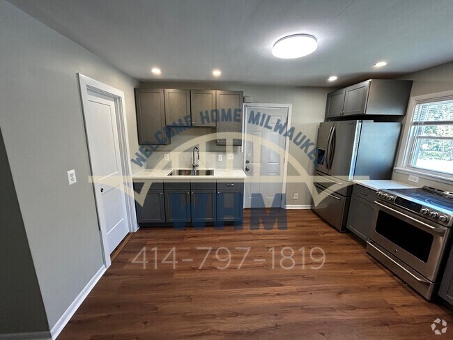 Building Photo - 3045 N Booth St Unit Back Cottage Rental