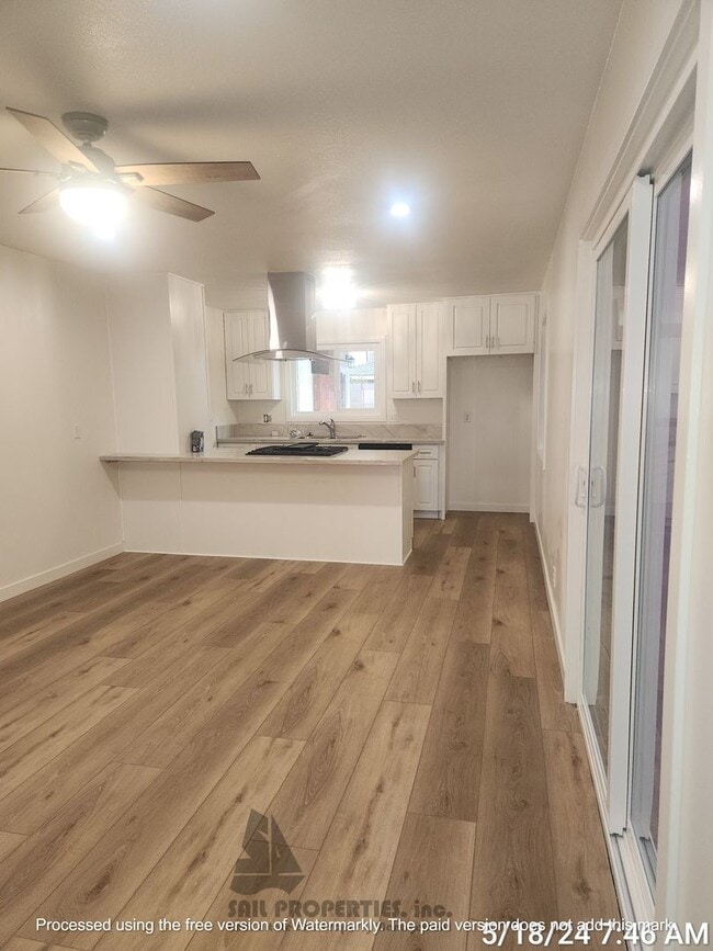 Photo - Welcome to this stunning 4-bedroom, 3-bath...