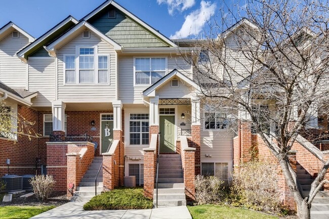 Building Photo - Stunning 3-bed 3-bath townhome that features hardwood floors and an attached 2-car garage!