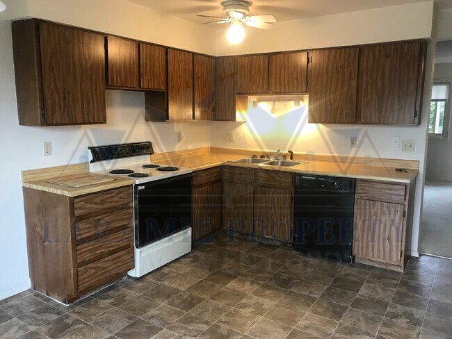 Photo - 3-Bedroom Townhome with Fenced Yard & Detached Garage