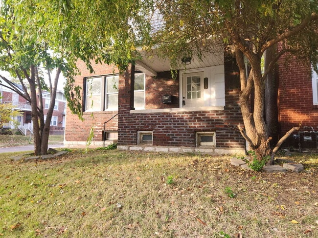 Building Photo - Charming & Spacious Updated Brick Home – P...