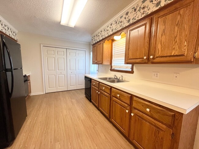 Kitchen with Dishwasher, Stove, and Fridge - 122 Mall Cir