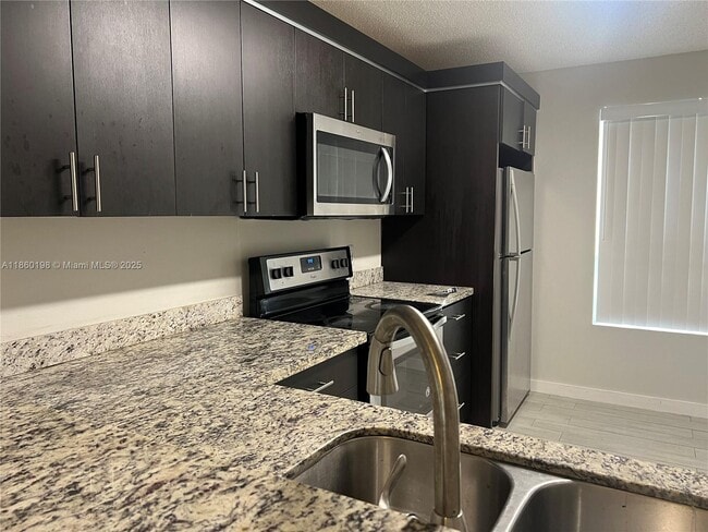 Building Photo - 2228 SW 80th Terrace Unit 2228 Rental