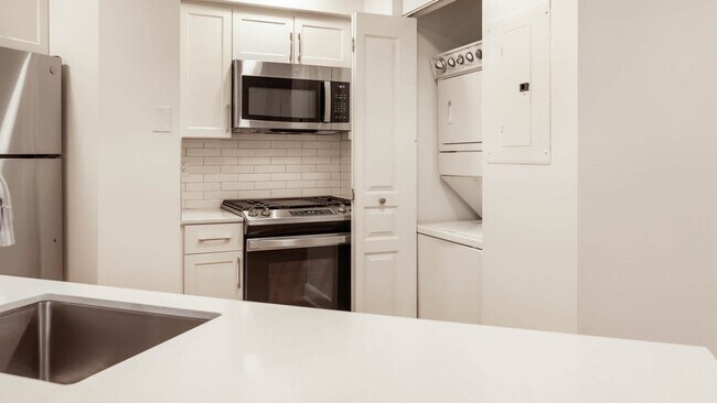 Kitchen with In-home Washer and Dryer