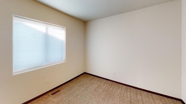 Photo - Stylish Living in a 3-Bed, 2-Bath Townhome with a 2-Car Garage Unit 566 Westwind