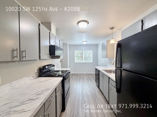 Building Photo - 10020 SW 125th Ave Unit #208B