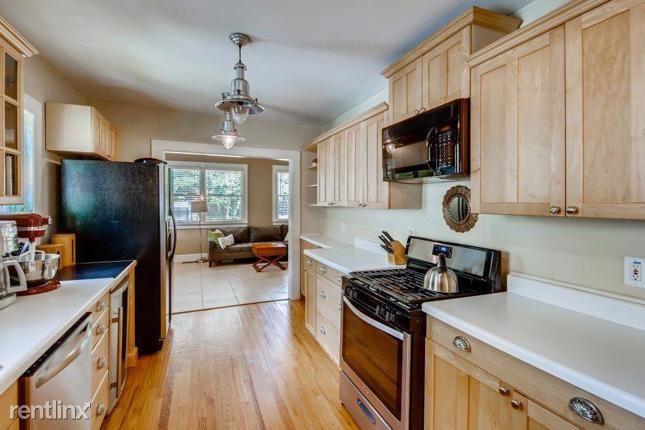 Kitchen comes with updated cabinets - 1038 S Candler St