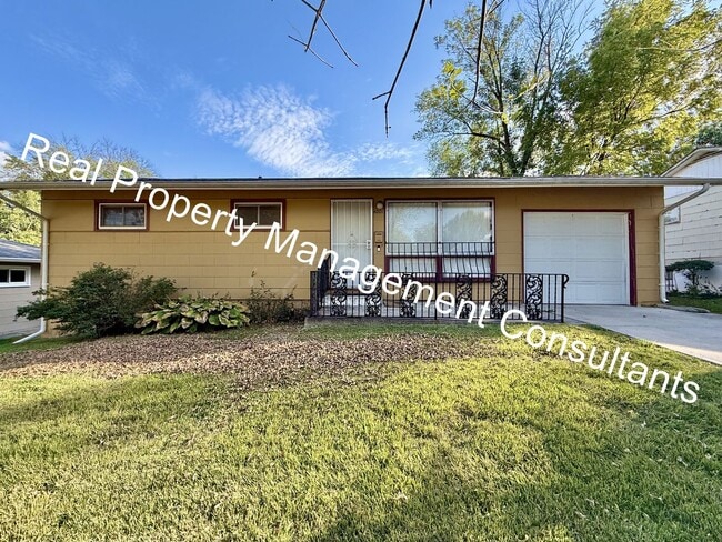 Photo - Charming 3-Bed Home with Fenced Yard & Garage