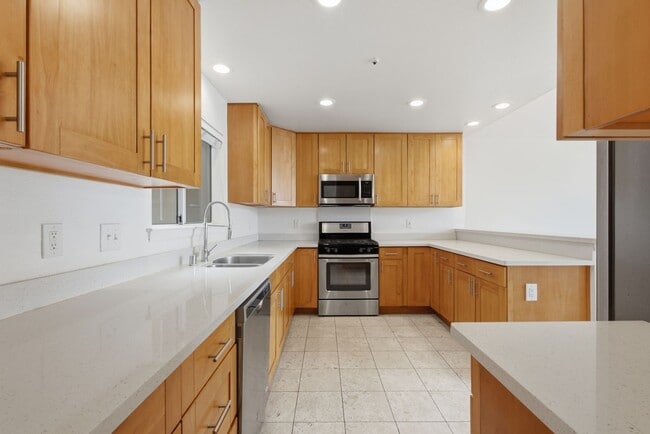 Photo - Top-Floor 3BR in Duplex Near BART | Vaulted Ceilings | In-Unit Laundry | Garage Parking