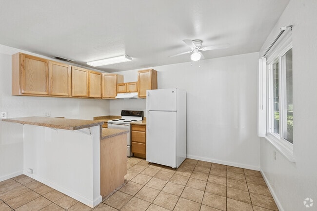2BR, 1BA - 800SF - Kitchen - Dining Room - Woodside Gardens Apartments