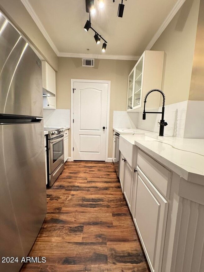 Building Photo - 1701 E Colter St Unit 219