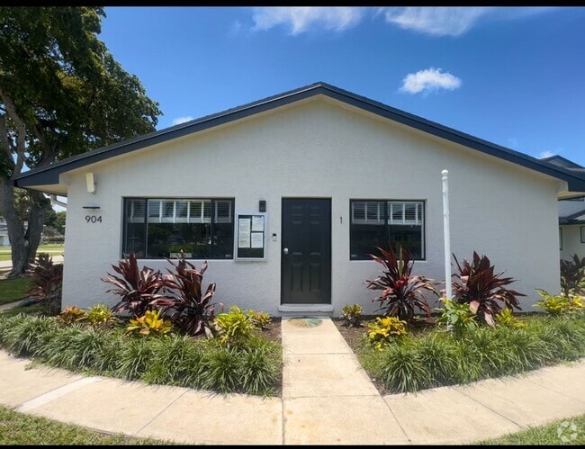 Building Photo - Clean and New with Garage Parking Included... Rental